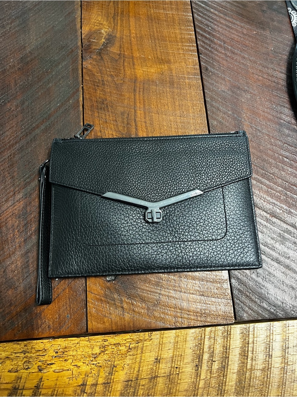 Like new BOTKIER black leather wristlet